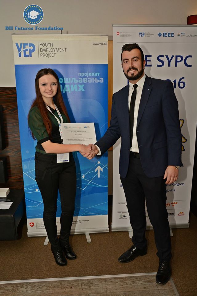 Jasna Nuhic receiving the award from the Bosnia & Herzegovina Futures Foundation Founder & Chair, Dr. Edhem (Eddie) Custovic