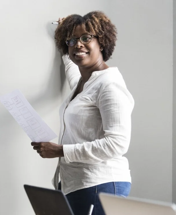 black-woman-writing-on-white-board2.jpg