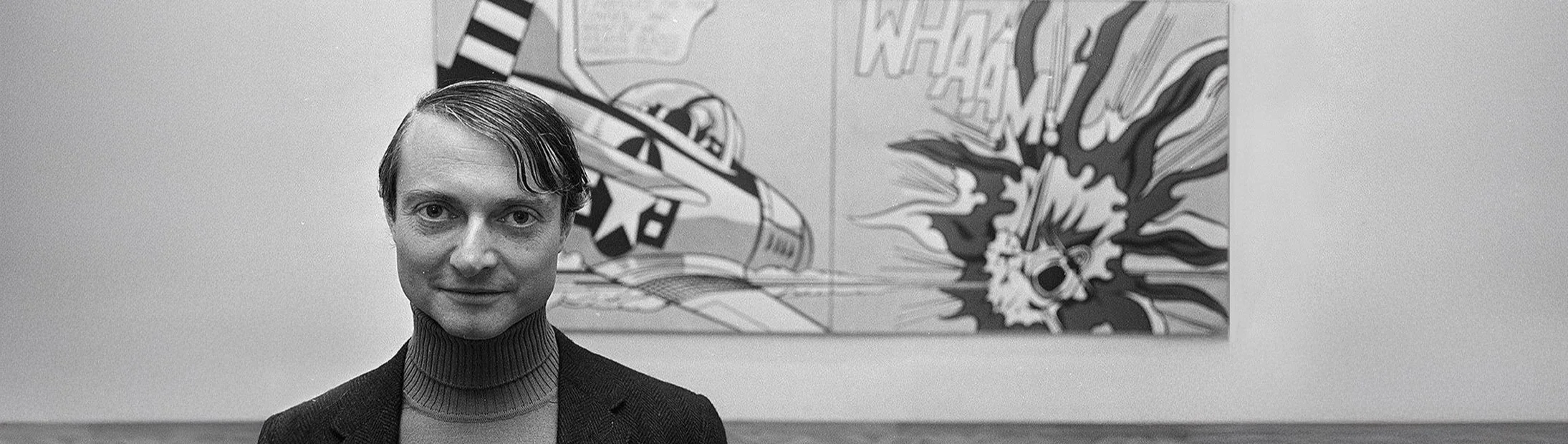 Roy Lichtenstein in front of his Pop Art painting Whaam!