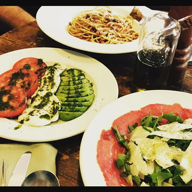 It&rsquo;s nearly the end of another sunny week and the best way to finish it is a visit to your favourite Italian, so come and say hi!  #weekend #sunday #summer #spread #carpaccio #tricolore #salad #spaghetti #bolognese #instafood #restaurant #itali