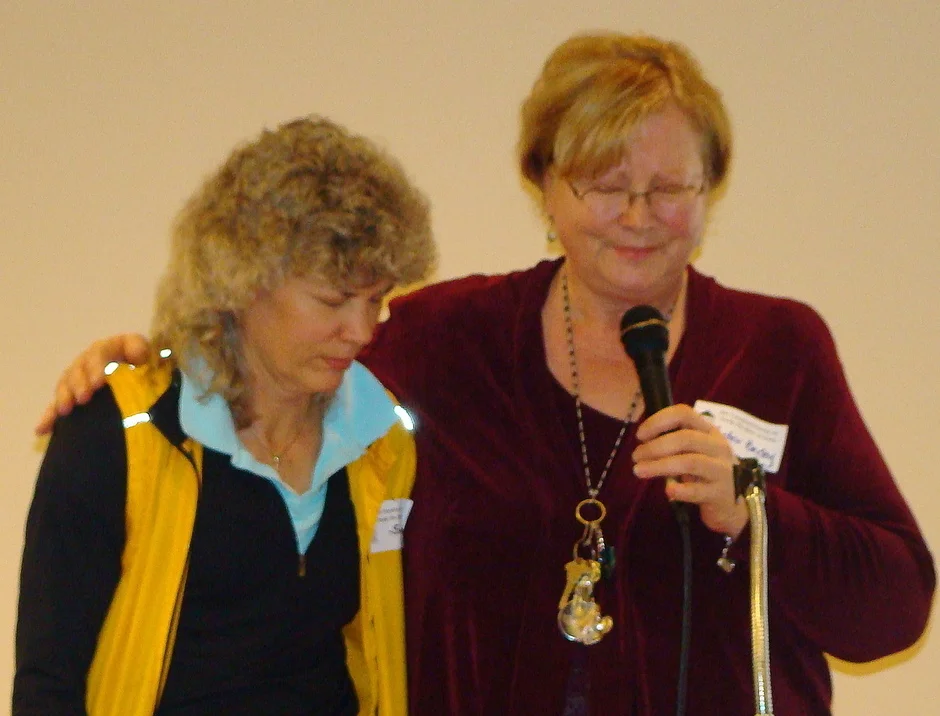 Sue with Pastor Becky, Elim Church- Hope Avenue, praying for God's guidance. Sue Watlov Phillips