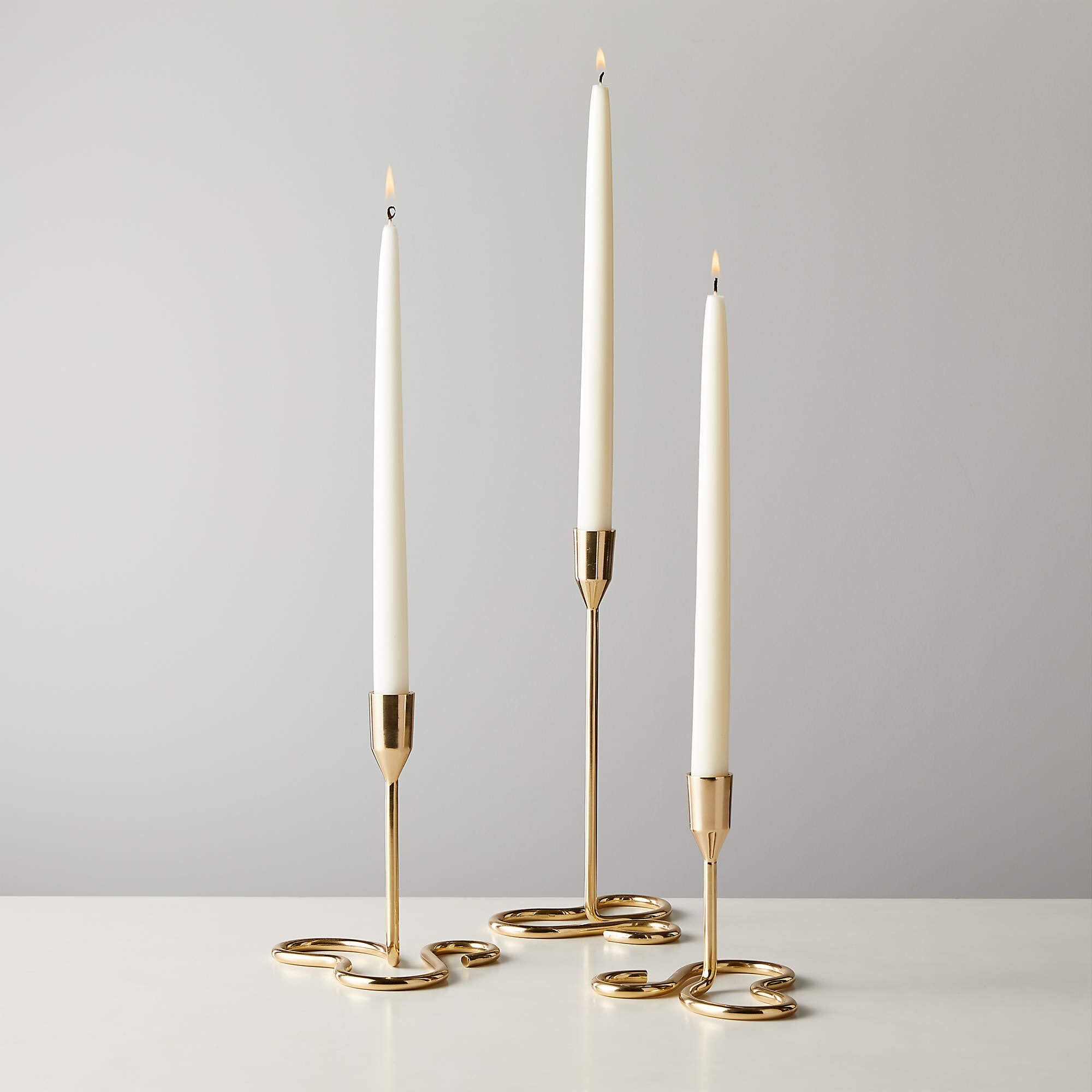 motion-brass-taper-candle-holders.jpeg
