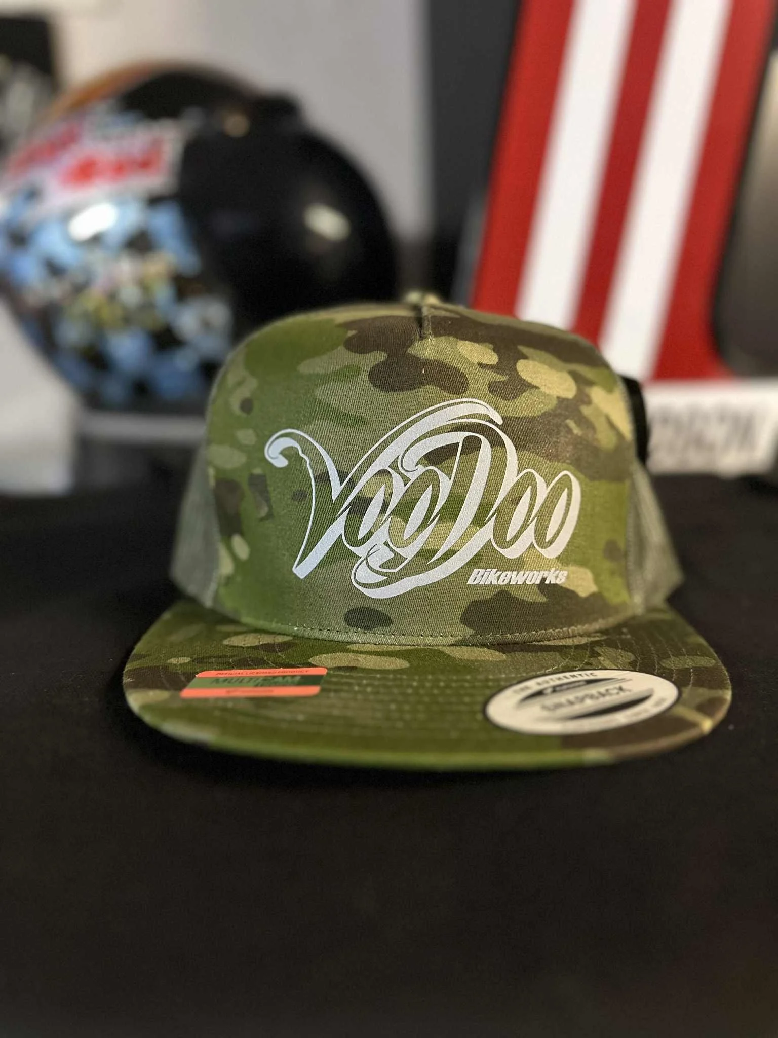 Grey Logo Flatbill-Jungle Camo Mockup.jpeg