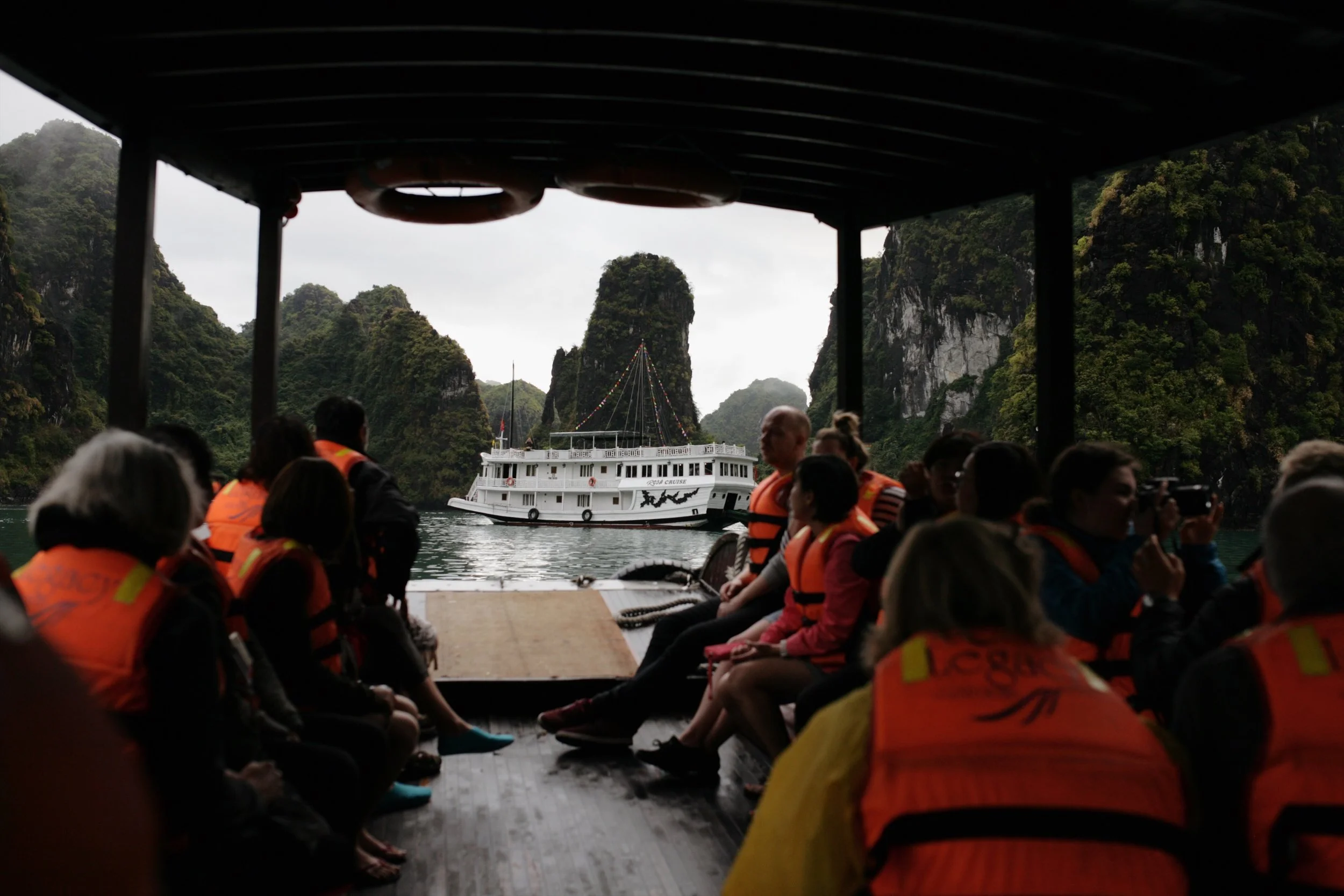 taking a small boat over to walk inside a cave