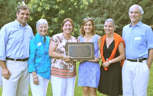 The Mullen family with the Peter P. Mullen dedication plaque. Left to right: Jeff Mullen, Billie Mullen, Kirby Mullen, Lucy M. Ball, Elaine M. Peer and Peter C. Mullen.