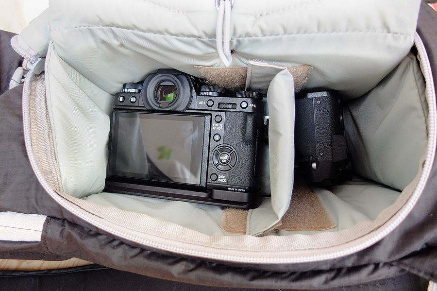 Camera compartment with Fuji X-T1 + 10-24 wide angle zoom and X-T10 + small prime