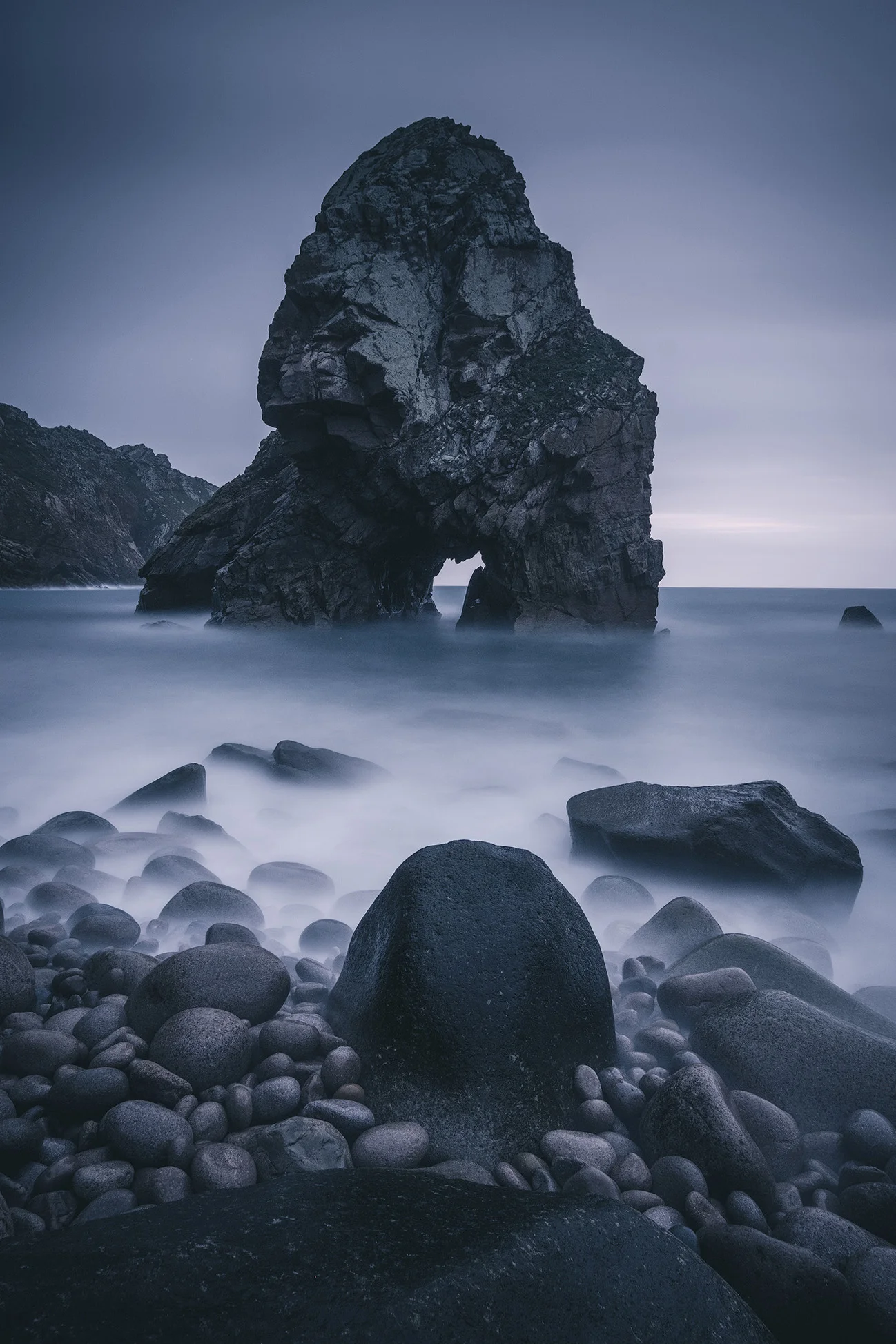 Louriçal Dusk Sometimes overcast skies and dull weather can really bring out the mood in a landscape. This beach on Portugal's west coast is one of my favourites and I've shot it in many different conditions. The head skies we had in the spring really matched the atmosphere of the place.