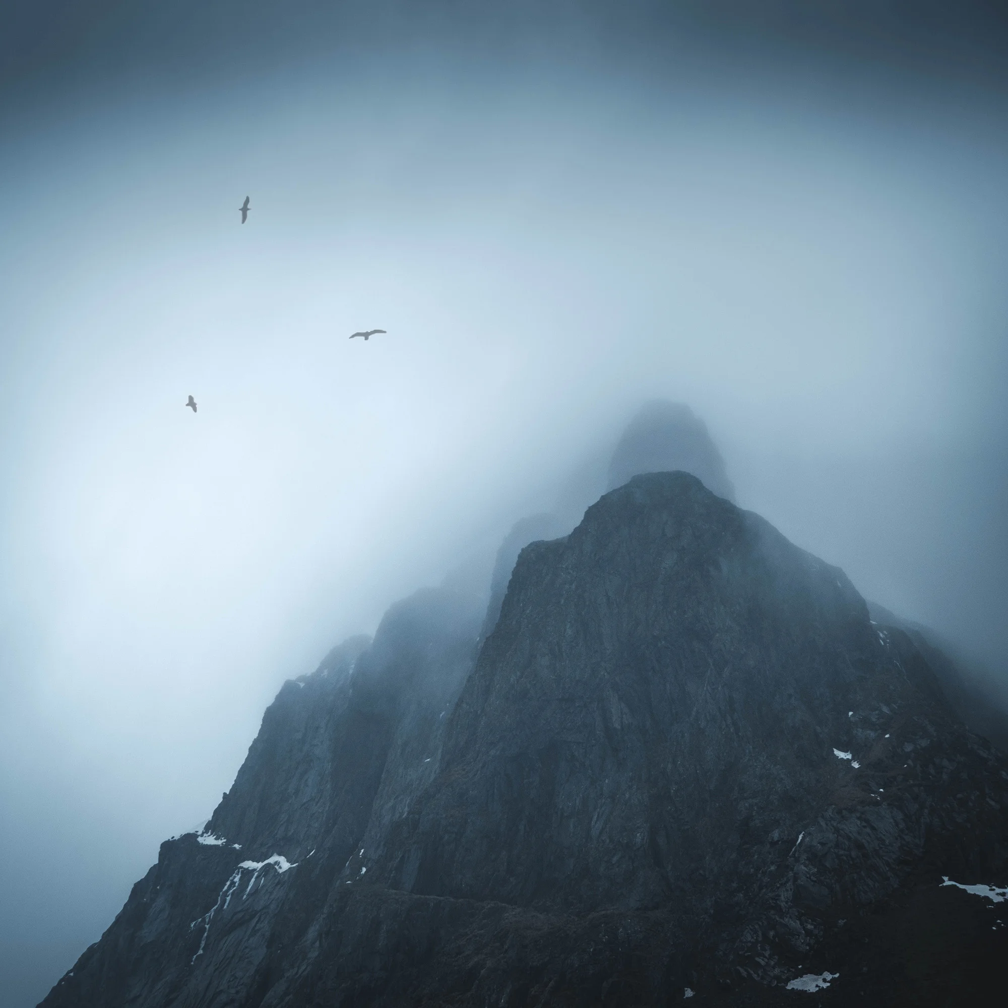 Lofoten Mountains Low lying cloud surrounds the granite peaks in the Lofoten Island