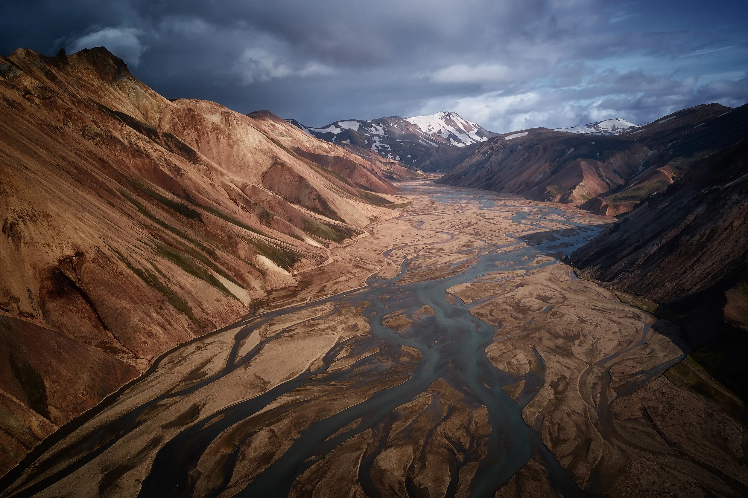 An aerial view of Landmannalaugar captured with a drone. Below are various abstract images taken in the area and some images from around Hnausapollur crater lake.