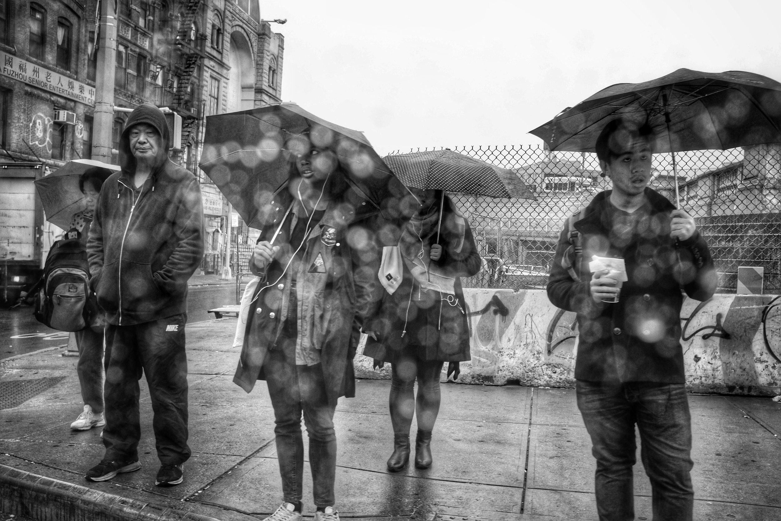 Rain. Canal Street. Chinatown. New York City. 2016.