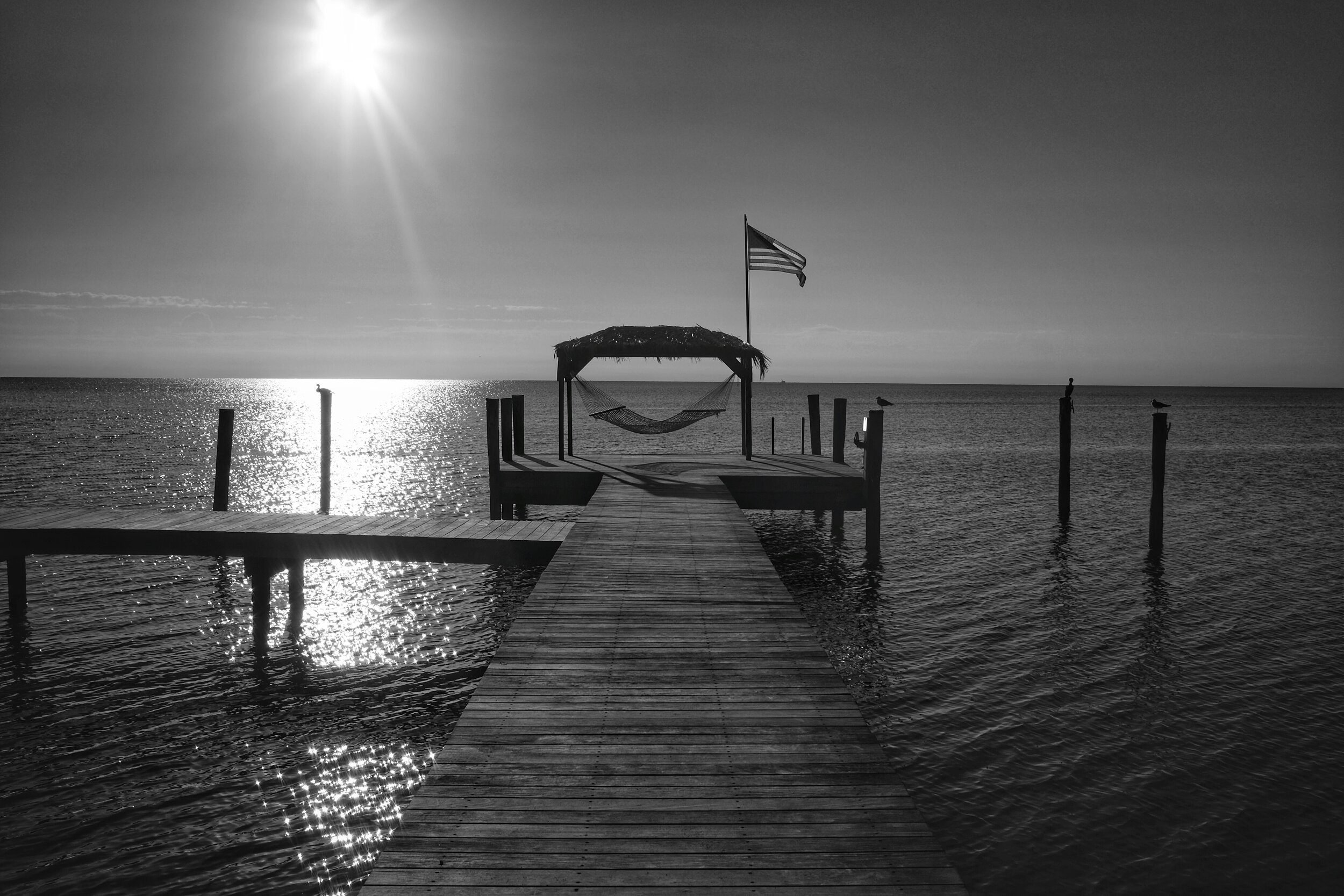 Hammock on Dock with American Flag. Islamorada. Florida. 2017.