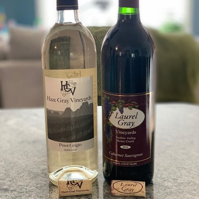 Choosing wine for #ncwinenight was hard (thus why we picked two)! After much deliberation we settled on the Pinot Grigio from @hazegrayvineyards and the Cab from @laurelgrayvineyards. Cheers 🥂