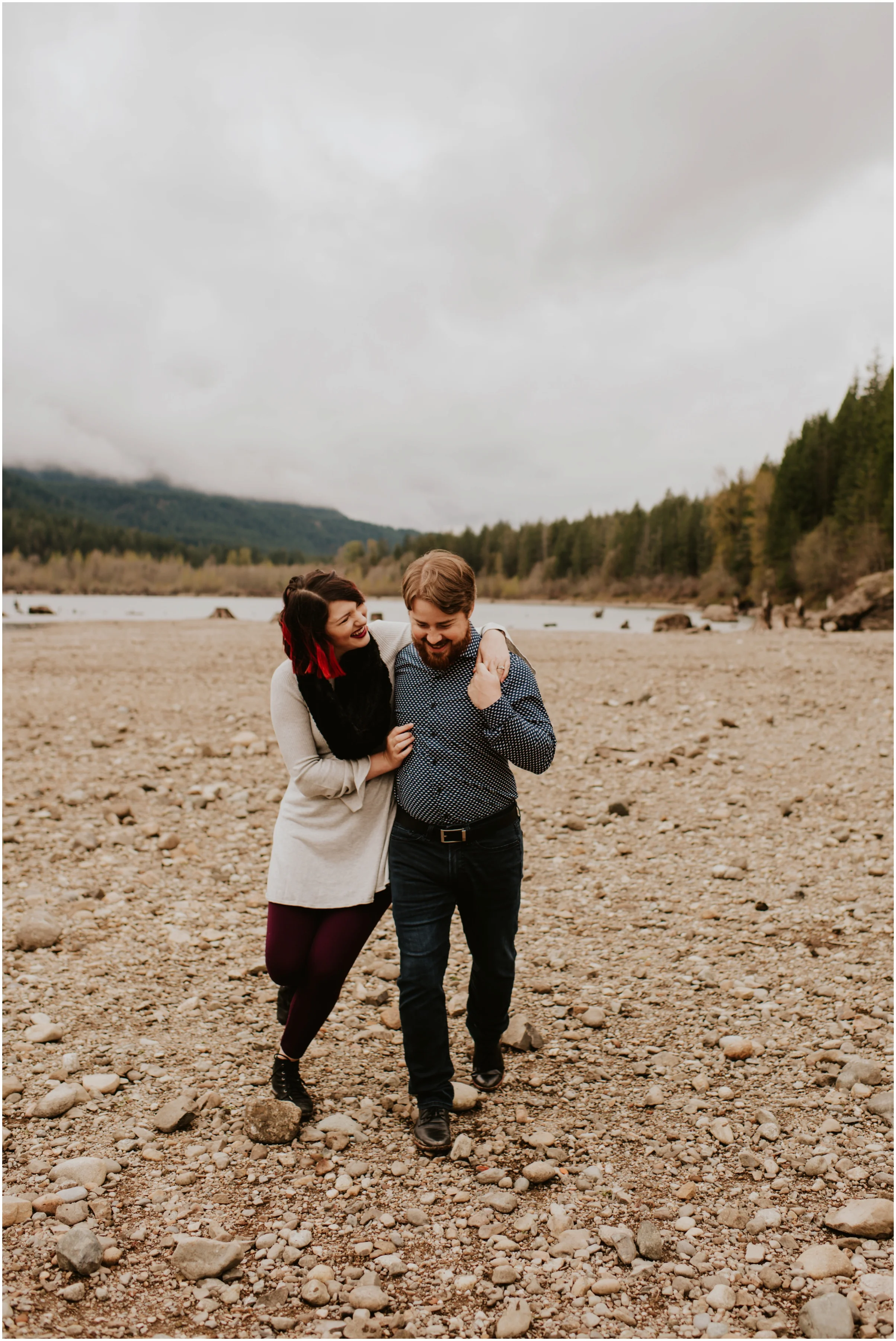 couple walking Rattlesnake Lake, WA | Engagement Photographer Seattle www.riversandroadsphotography.com www.riversandroadsphotography.com