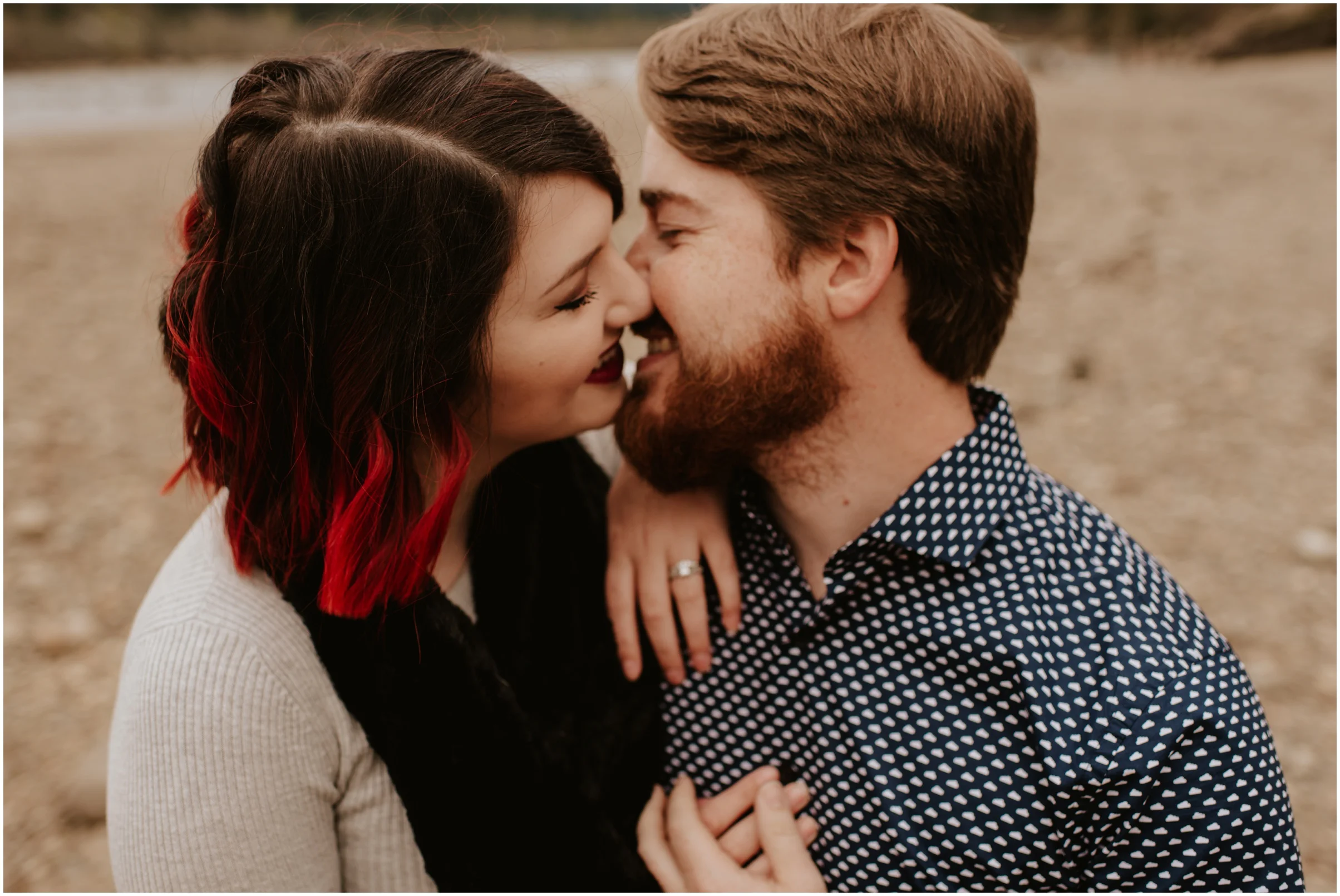 couple kissing at Rattlesnake Lake, WA | Seattle Wedding Photographer www.riversandroadsphotography.com