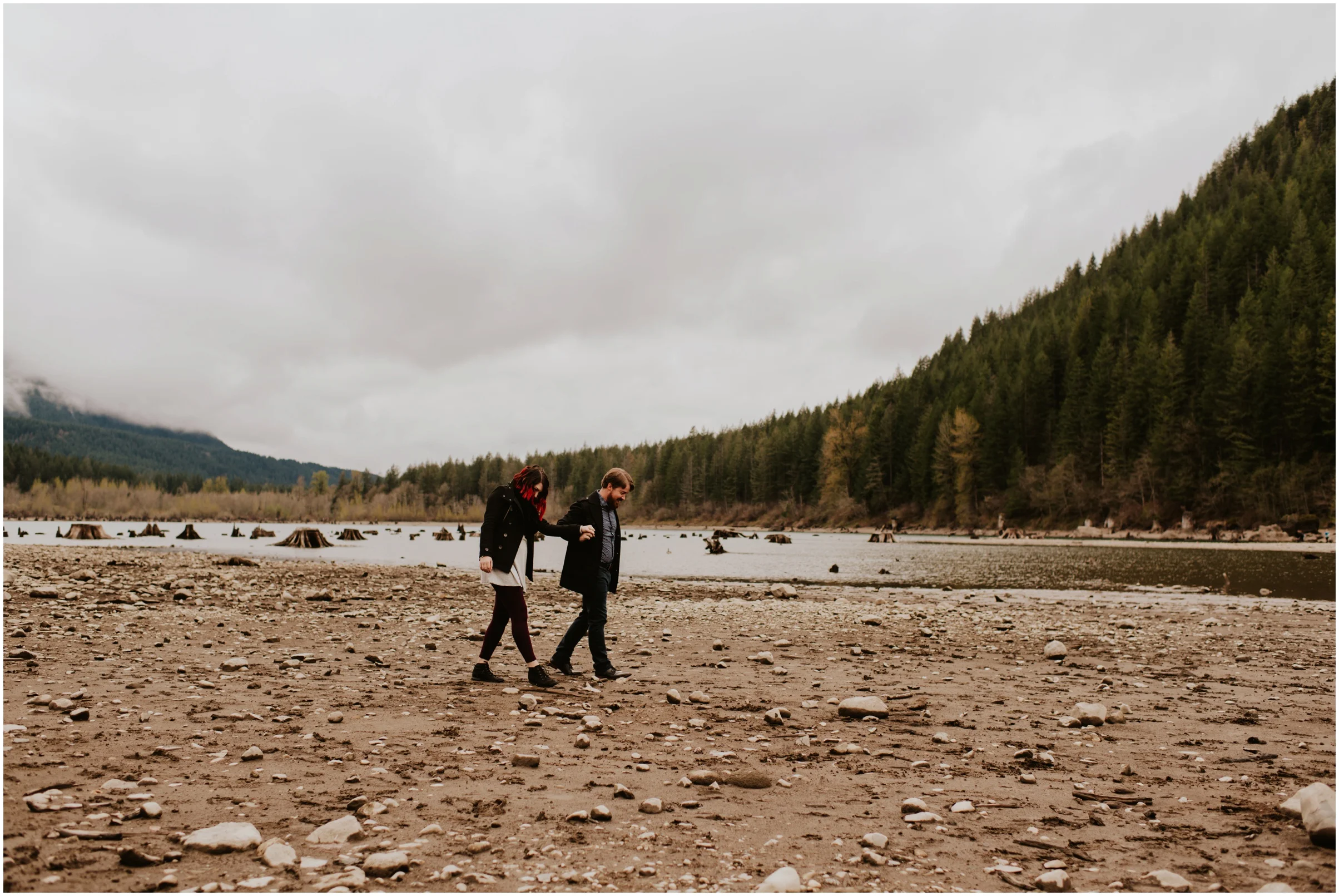 Couple walking on the beach at Rattlesnake Lake, WA | Seattle Wedding Photographer www.riversandroadsphotography.com