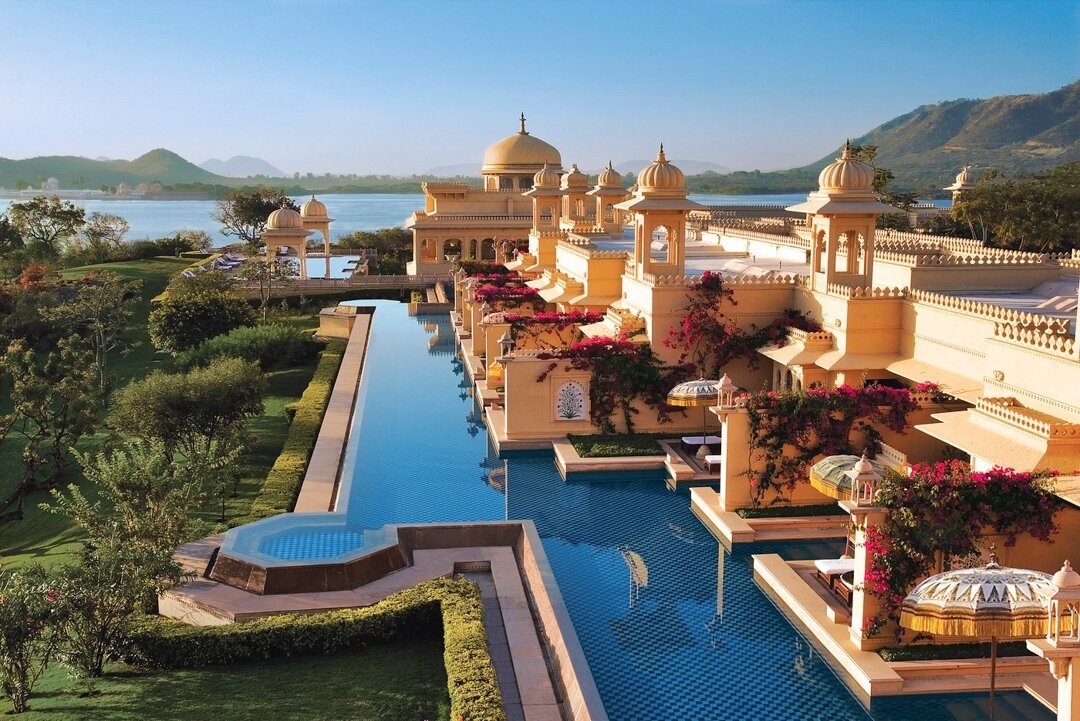 Settle into the welcoming luxury of The Oberoi Udaivilas, perfectly poised on the banks of Lake Pichola in the captivating city of Udaipur, India! ⁠
⁠
During your stay, partake in a peaceful boat ride across Lake Pichola. Marvel at the stunning archi