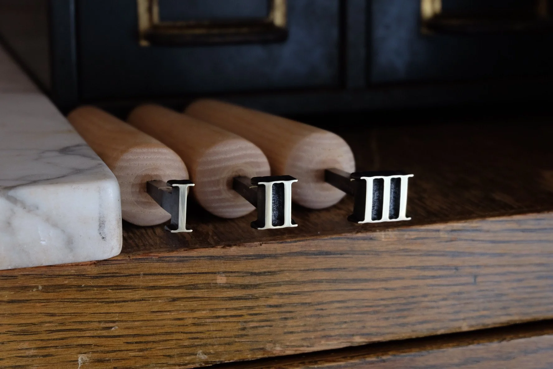  Custom Numerals Cut for Peter Geraty of Praxis Bindery 