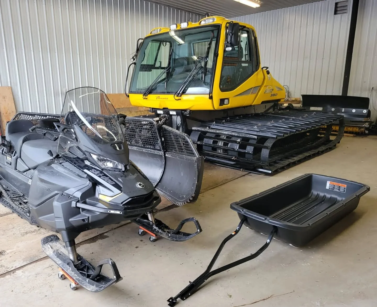 Oh boy! Brand new snowmobile AND brand new track on the snow cat. Feeling fresh and fancy...and impatient to get rolling! Forecast is looking promising. Really hope we still hit our opening date of Dec 19th or earlier!! 
No more lift line check with 