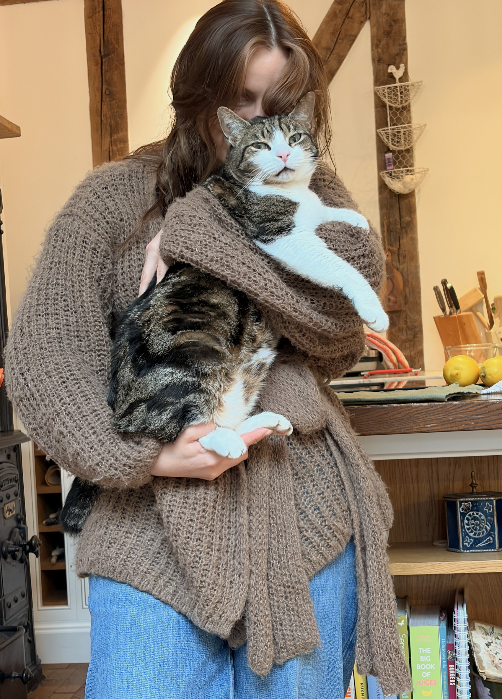 Gem holding Matilda in her arms at Berry House.