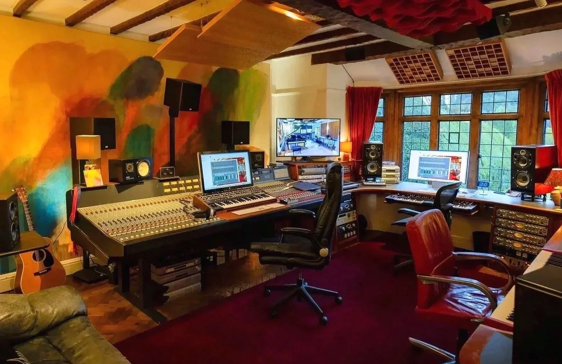 Curtis Schwartz Studio control room in Sussex with Dolby Atmos monitoring and large analogue mixing console