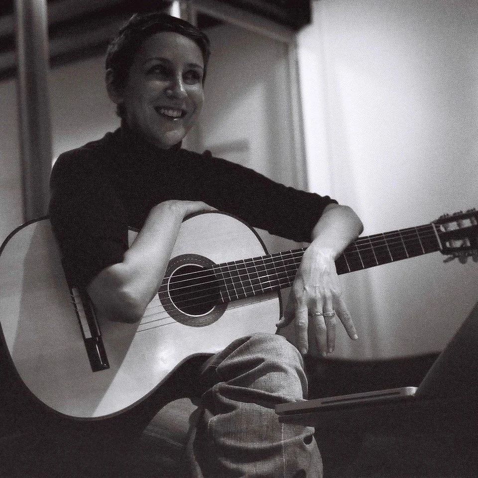 Stacey Kent in the studio with guitar during a quiet moment between recordings.