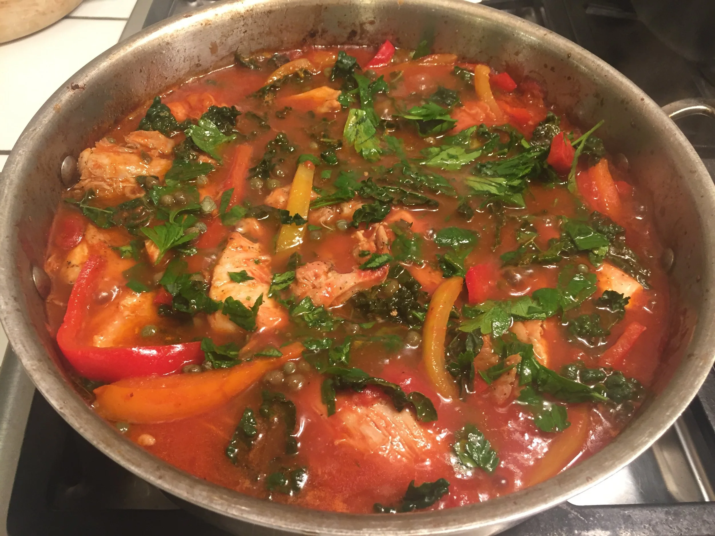 One of my favorite one pot meals, chock full of tomatoes!. I use a 28 ounce can of crushed tomatoes and 4 peppers (red, yellow and orange) in Giada de Laurentis Roman Style Chicken . 