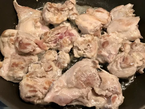 I doubled the recipe and used 8-10 boneless skinless chicken thighs. I get in there with kitchen shears and cut out as much of the yellow and white fat as possible. Brown 4-5 minutes on each side in a skillet with 2 Tbsp of oil.