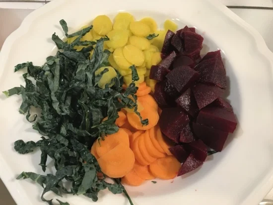 Thinly sliced kale, carrots (yellow and orange) and beets. I also love the golden beet variety.