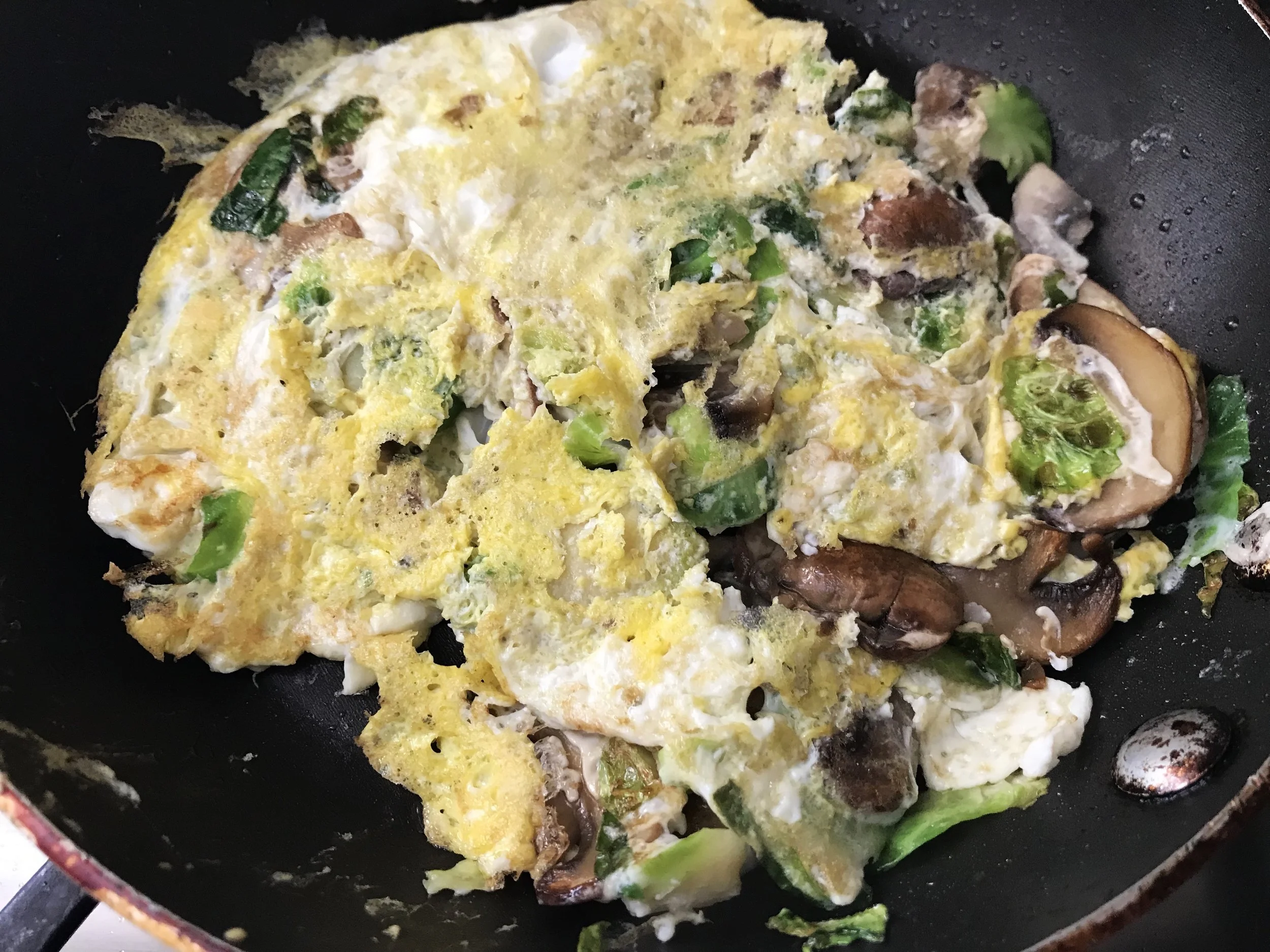 Add 1 egg and 1 egg white and scramble. I don’t care so much to make a beautiful omelette, just scramble it and flip it over!