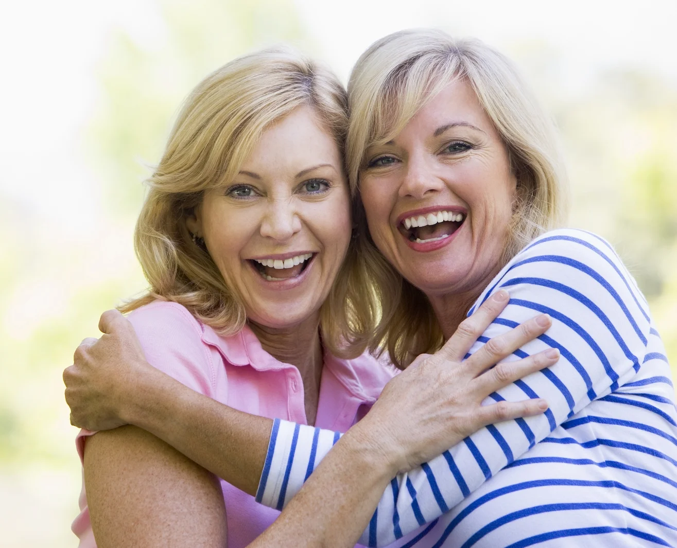 bigstock-Two-Women-Outdoors-Hugging-And-4133047.jpg