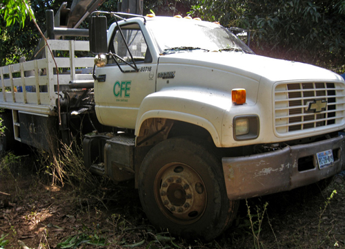 CFE Truck in the Jungle. This truck has a winch for tightening the cables onceon the poles.