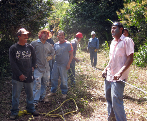 CFE Local Contractors Laying Aluminum Cable Through the Jungle. (One of them did not want to be in the photo…Could he be one of the copper thieves?)