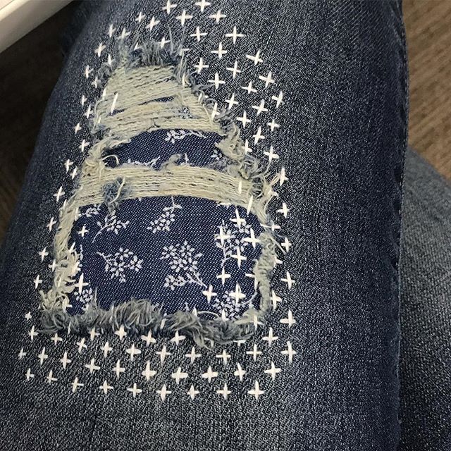 // sashiko stitched and patched those jeans