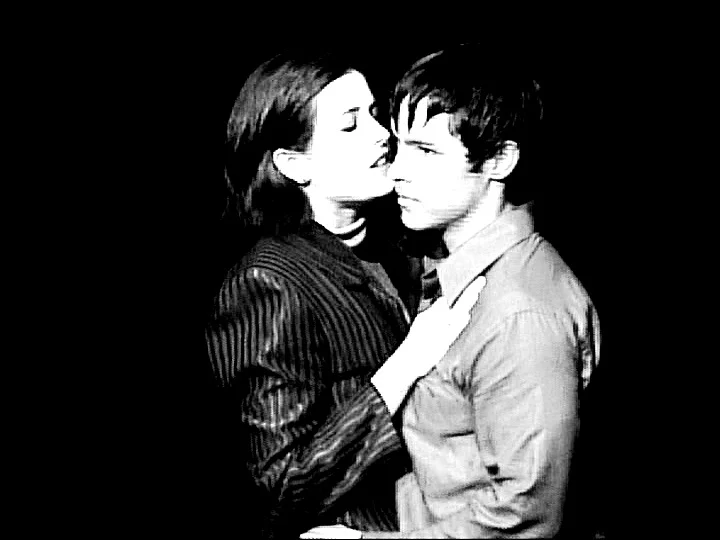 Emily Vise McBride (L) as Philly and David Hogan as Henry in DEAD BRAINS by Erik Champney.