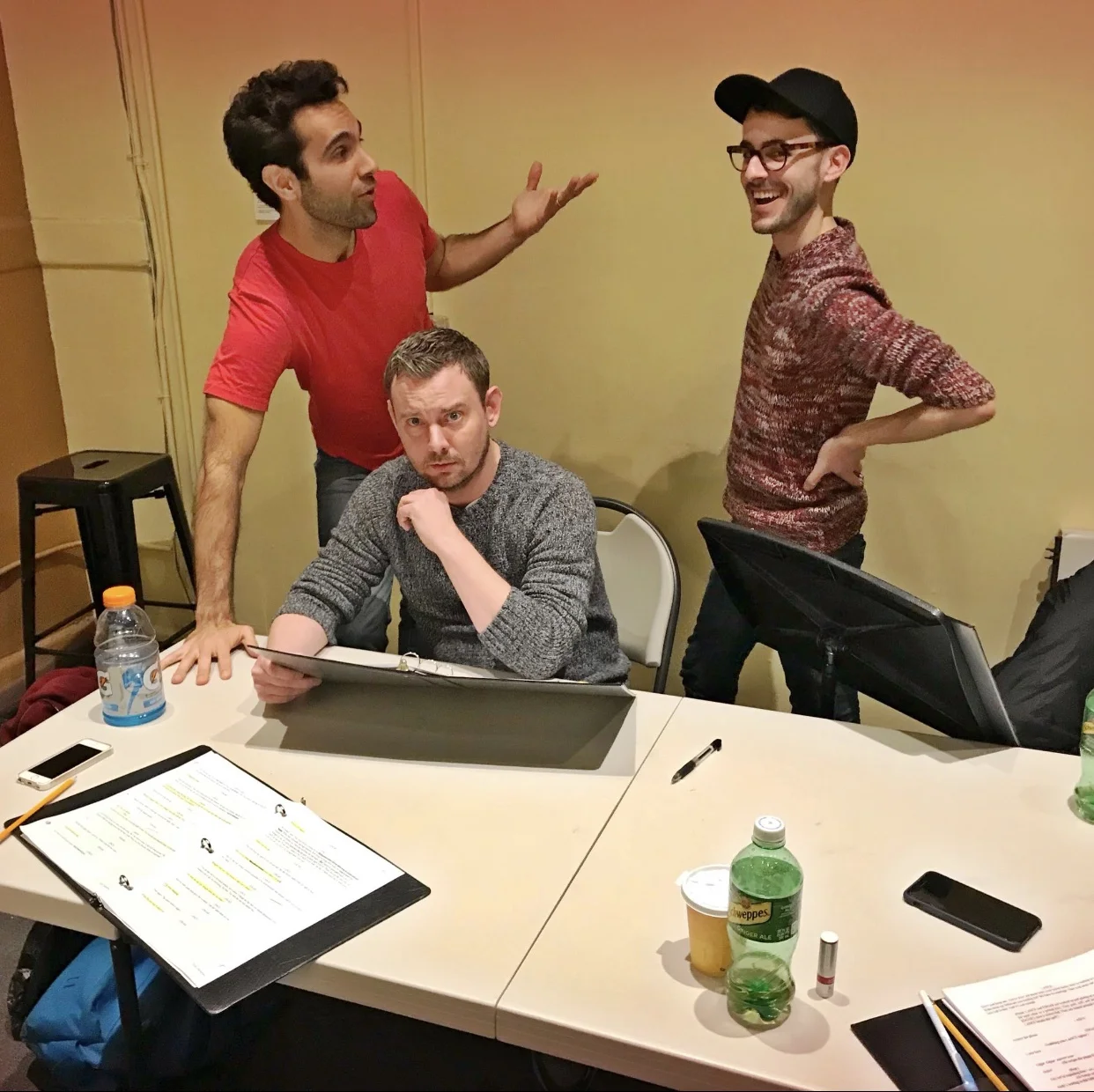 Playwright Erik Champney (center) doesn‘t know how he feels about being this close to his play. Wil Petre (L) and Remy Germinario are really in-your-face performers.