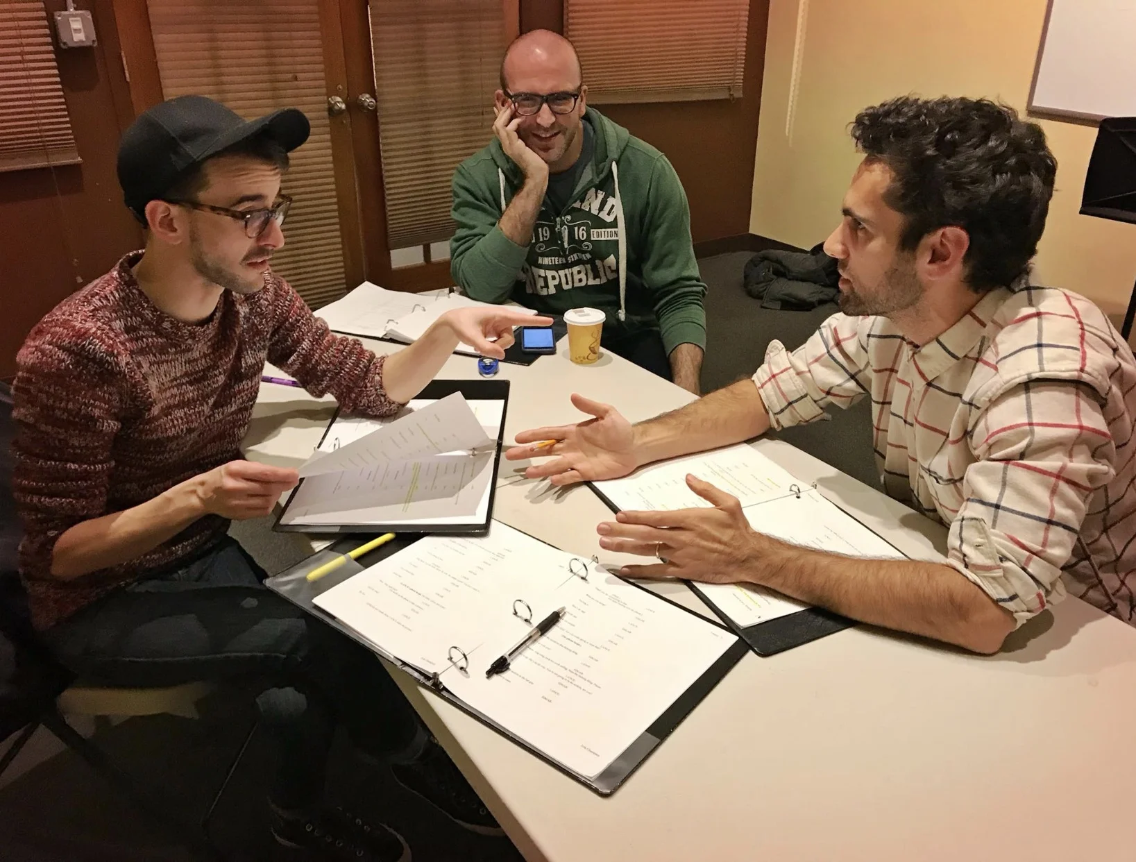 LEGACY (La MaMa): director Shaun Peknic looks on as Remy Germinario (L) as Lance and Wil Petre as Edgar discuss the burdens of love and the politics of sex.