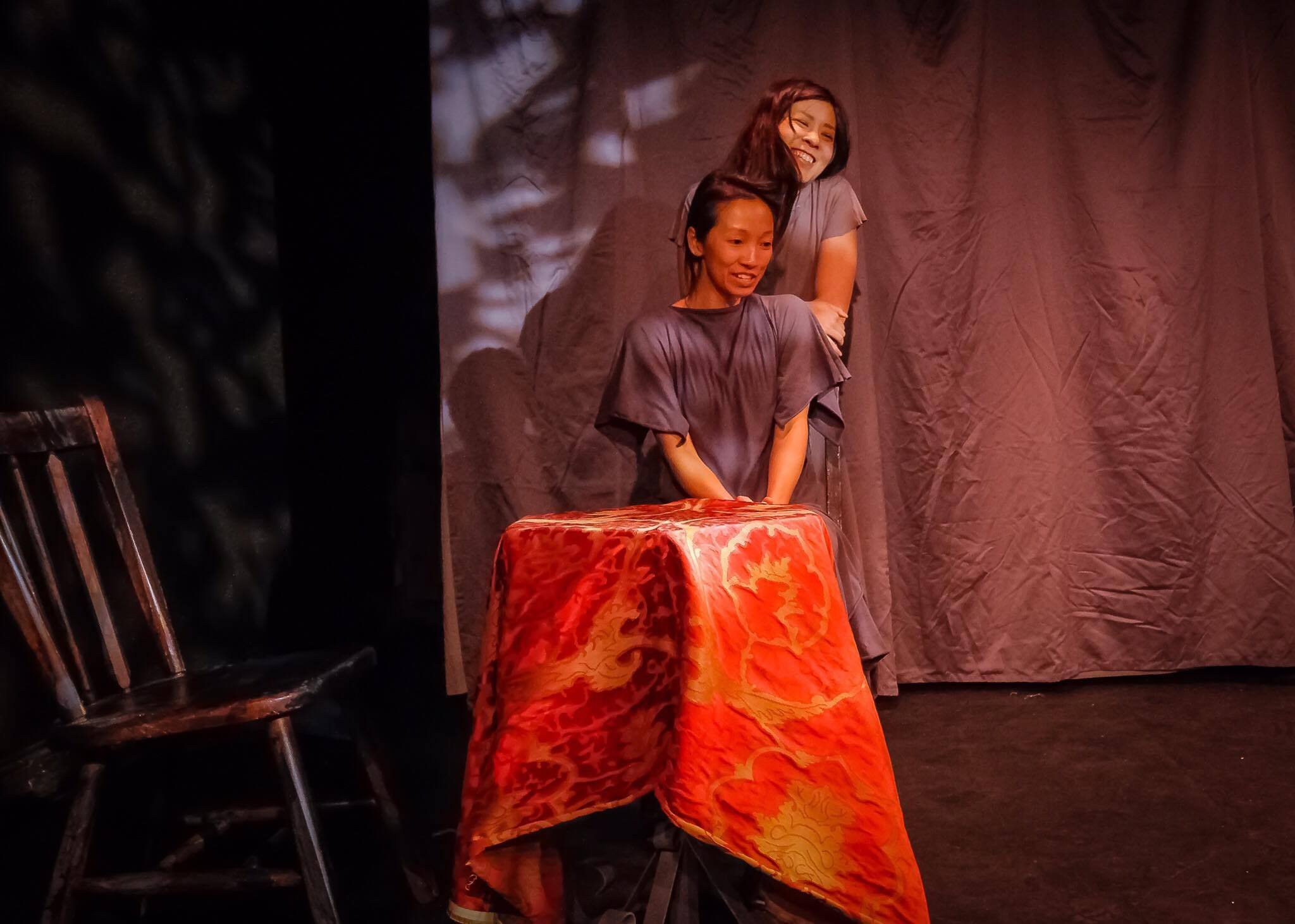 Paradise Factory (New York, NY): Meggy Hai Trang (standing) as Daiyu and Adelyne Liu as Nuying in SAITAMA 埼玉 by Erik Champney. Photo by Bryan Cash.