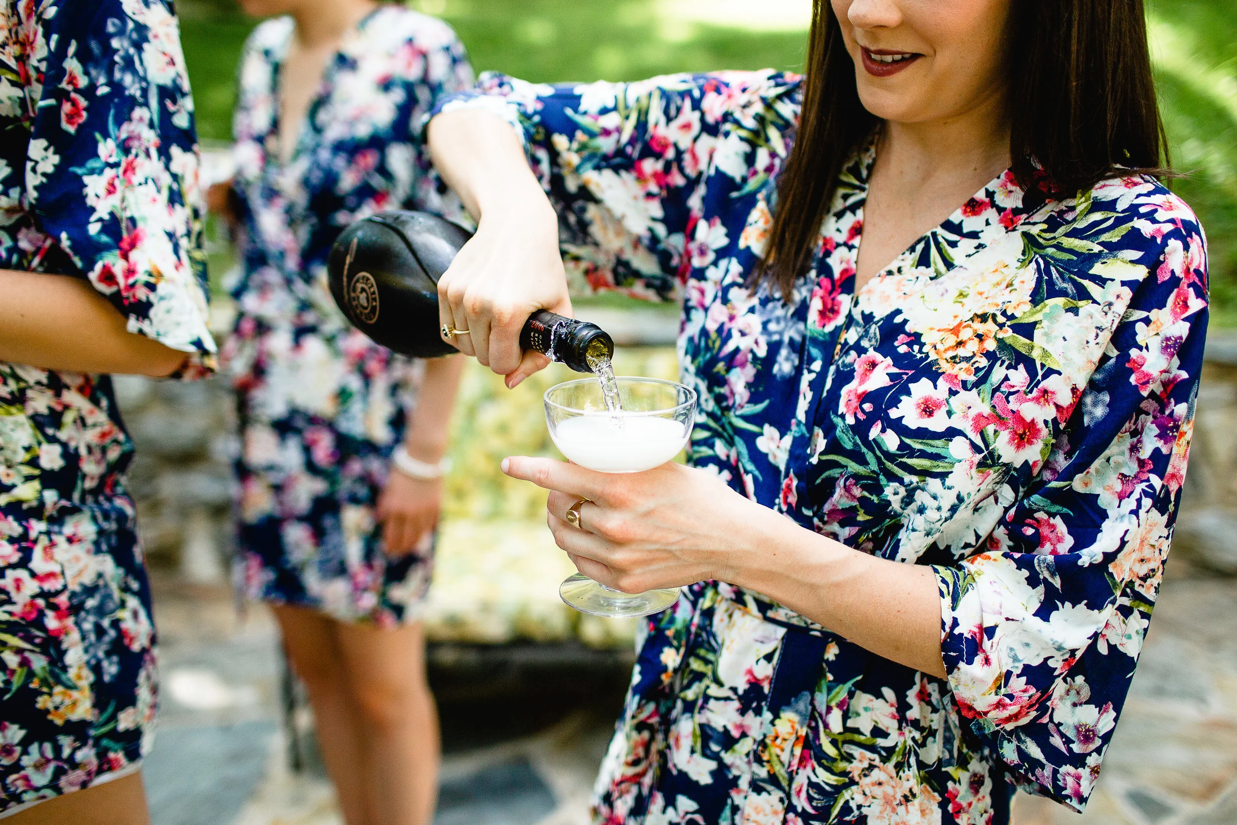 Bridesmaids celebrate before the ceremony. Photo by Sarah Fortney Bowmaster.