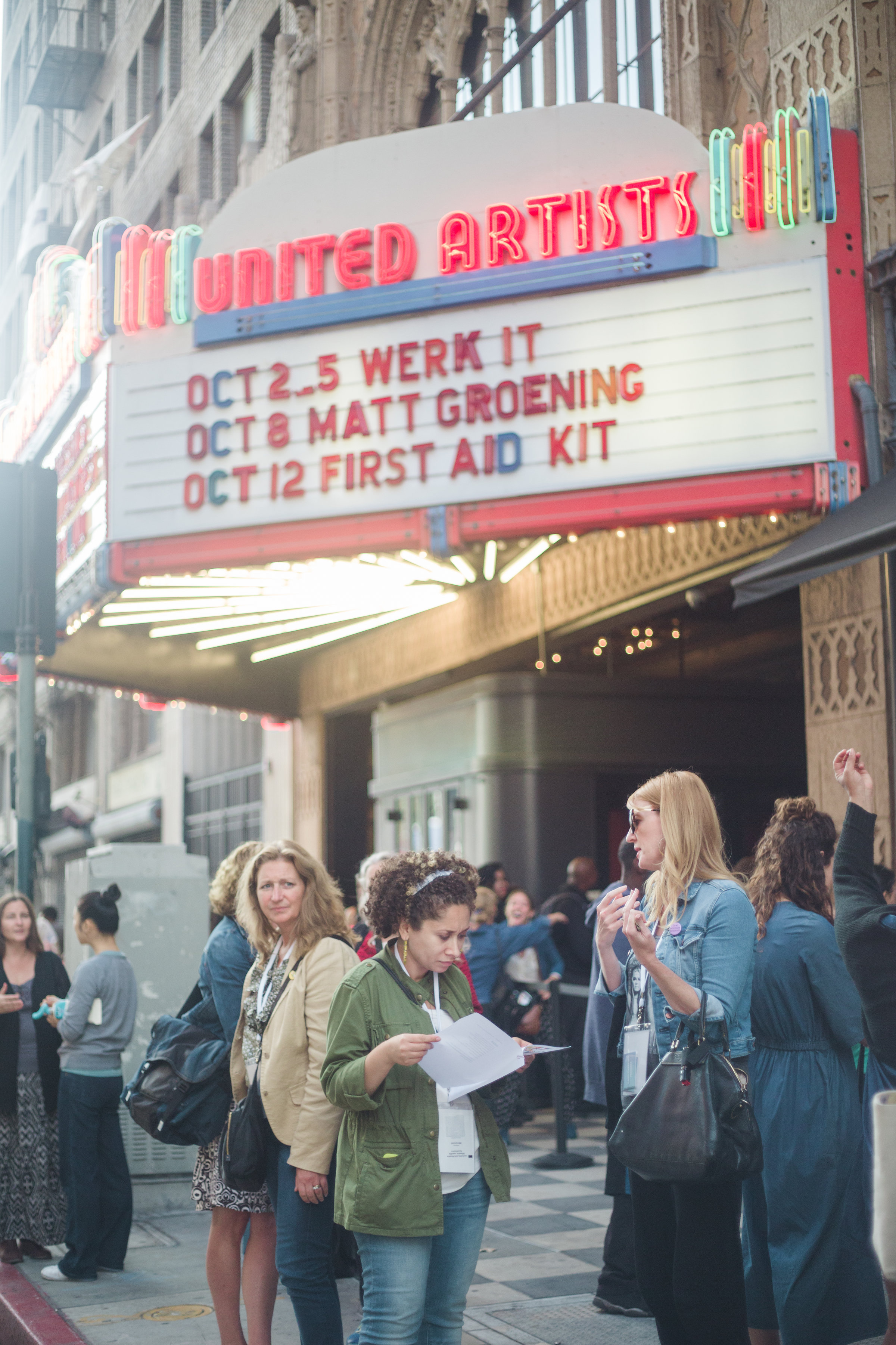 Festival attendees waiting outside the venue