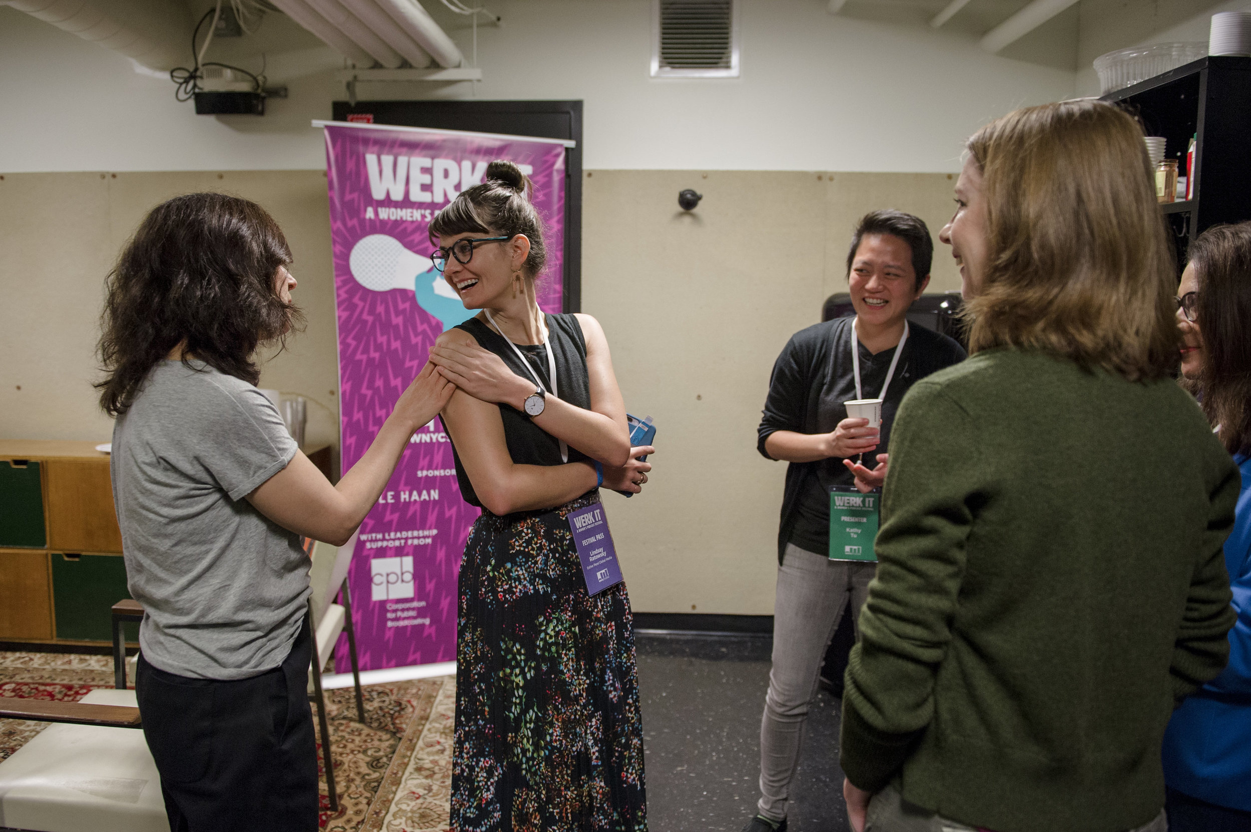 Group of panelists preparing in greenroom