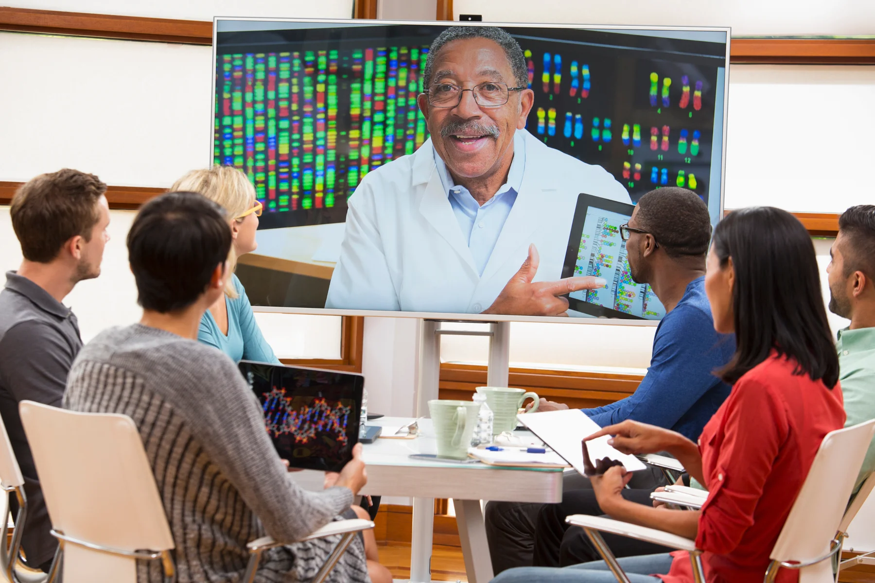 stock-photo-business-people-and-doctor-video-conferencing-in-meeting-156593861.jpg