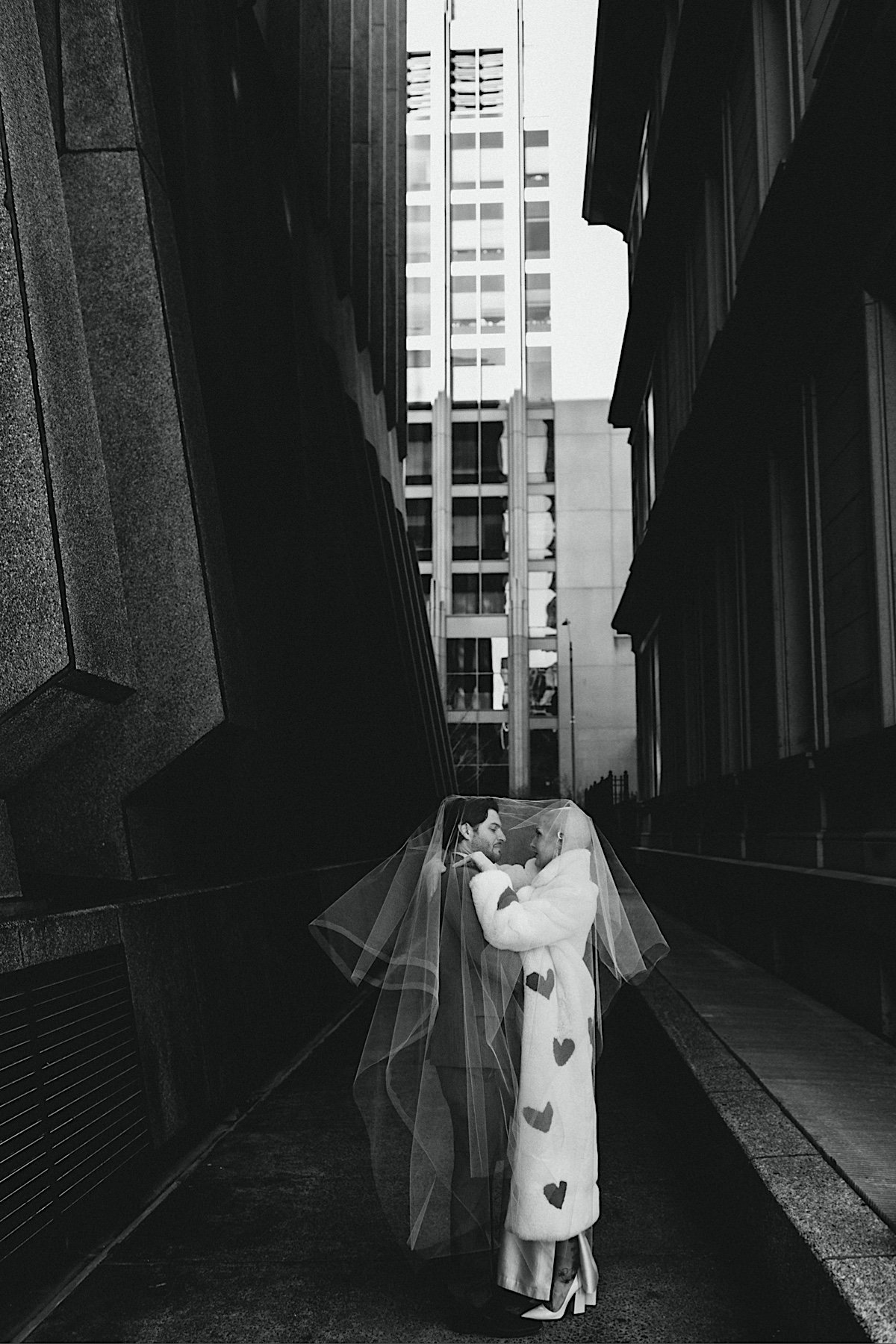 13_CMP-Alex-Marcelle-126_Trendy intimate downtown Raleigh, North Carolina wedding with heart coat.jpg