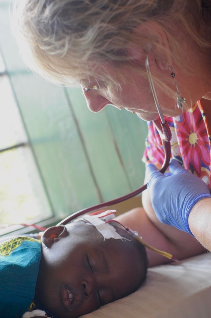 Debbie and child at Tarime Dispensary.