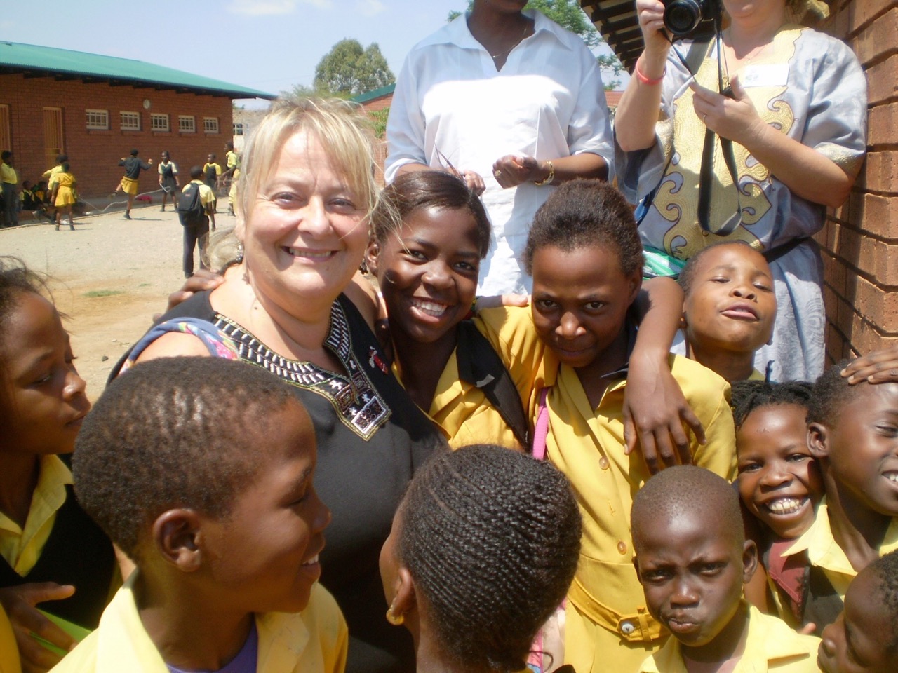 Debbie with Sjambok School students.
