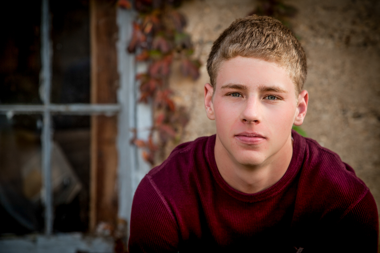 Portrait-HIgh-School-Seniors-young-male-in-front-of-window-012.jpg