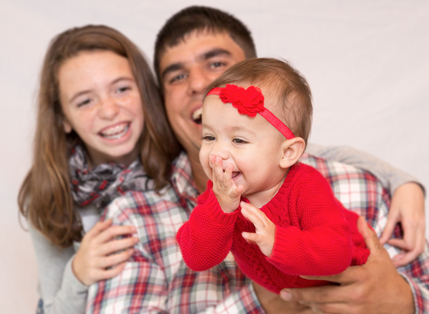 Portrait-Family-loving-family-of-three-dad-with-daughters-120.jpg