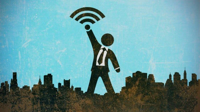 suit wifi held over city.jpg