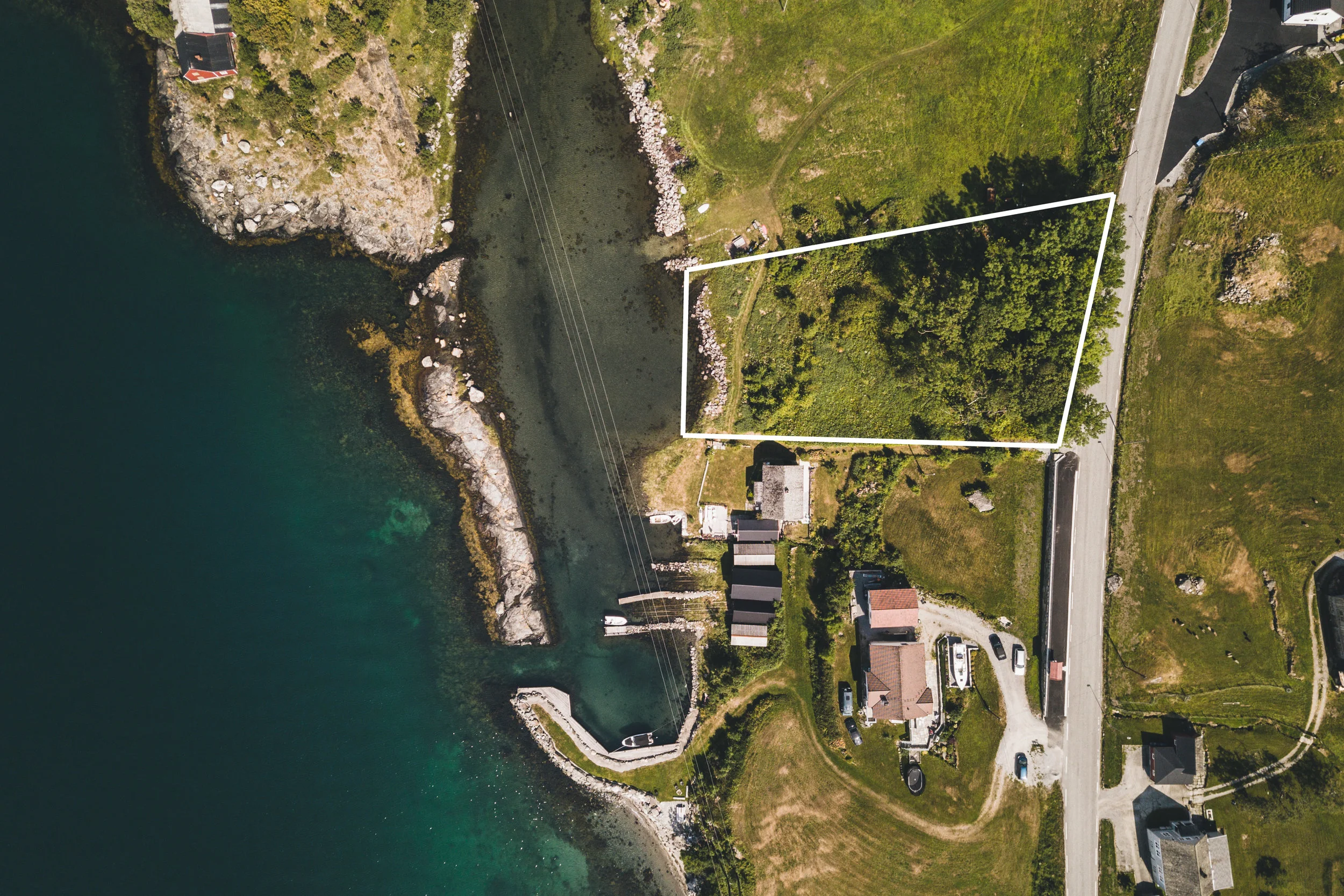 Dronefoto med utsnitt av tomtegrense.