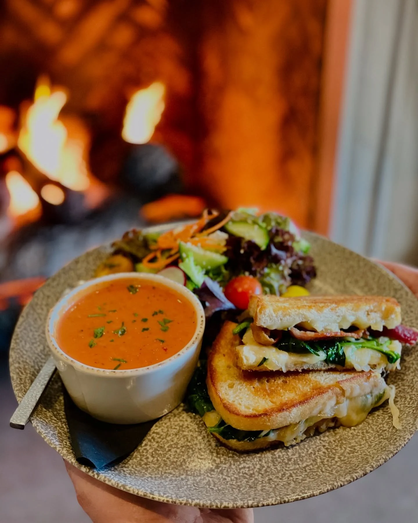 It&rsquo;s chilly outside&hellip; Come warm up by the fire with today&rsquo;s special! 

S.O.B. Grilled Cheese | spinach, caramelized onions, bacon, provolone and gouda, served with a cup of tomato bisque and side house salad. 

Lunch is served 11am-