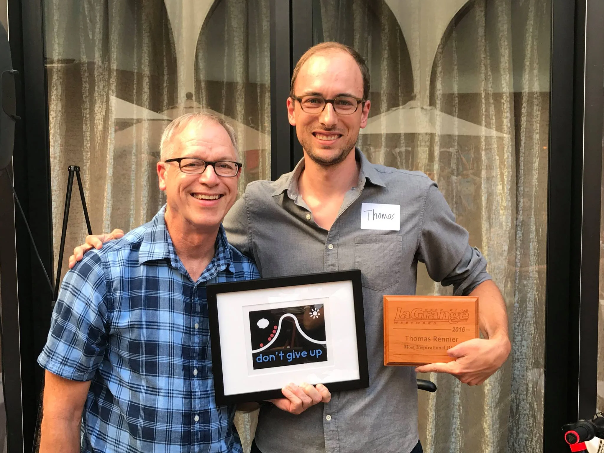 Dan Chapman with Most Inspirational Rider award winner Thomas Rennier.